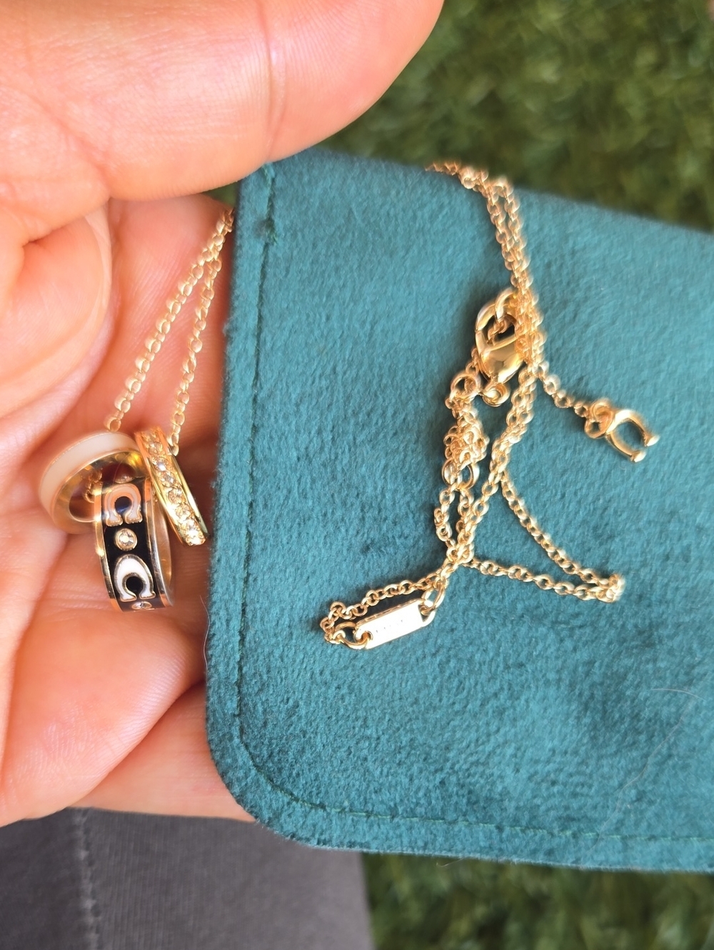 Coach Gold-Tone Necklace with Black and White Accent Rings